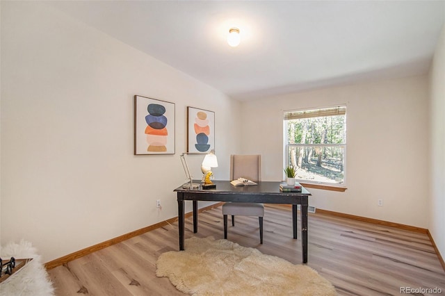 home office featuring light hardwood / wood-style flooring