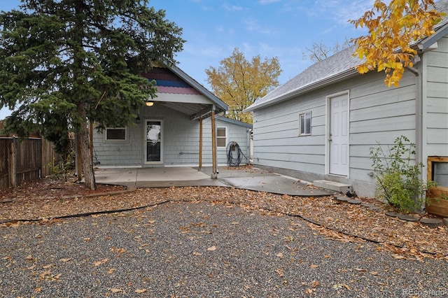 back of house with a patio