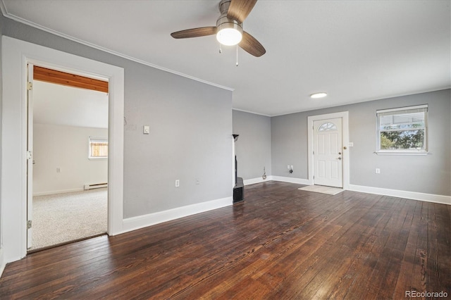 unfurnished room with a baseboard heating unit, dark hardwood / wood-style floors, and ceiling fan