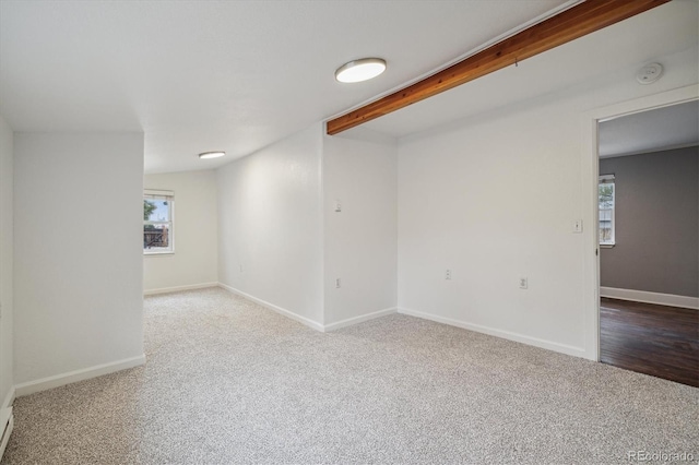 empty room with carpet flooring