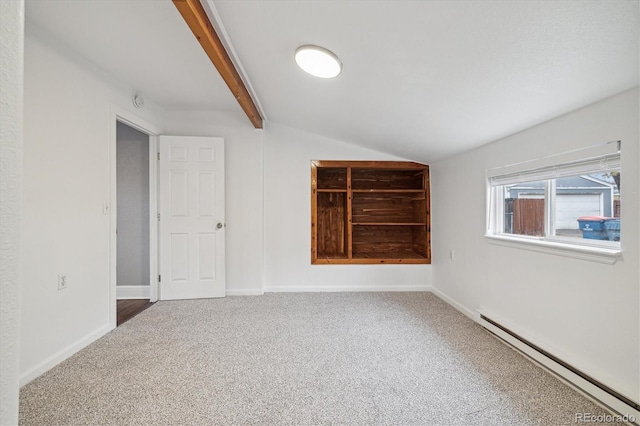 carpeted empty room featuring lofted ceiling with beams and a baseboard radiator