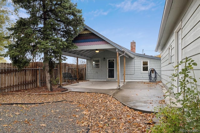 rear view of property with a patio area