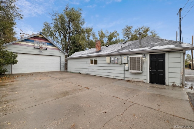 view of front of home with an outbuilding and a garage