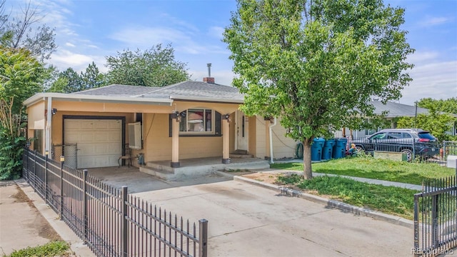 6871 Locust St, Commerce City, CO 80022 - view of front of house featuring driveway, a shingled roof, an attached garage, and a chimney