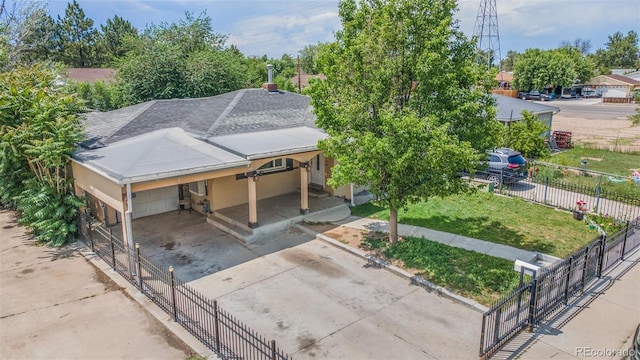 6871 Locust St, Commerce City, CO 80022 - view of front of property with concrete driveway, roof with shingles, and stucco siding