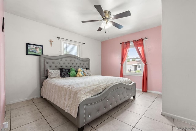 6871 Locust St, Commerce City, CO 80022 - bedroom with light tile patterned floors and a ceiling fan