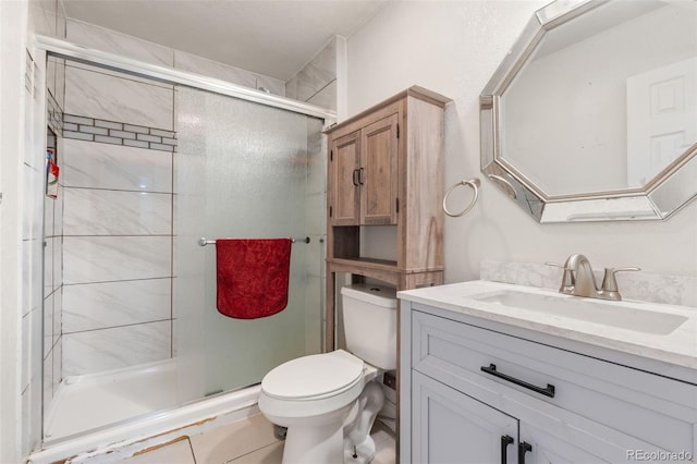 6871 Locust St, Commerce City, CO 80022 - full bathroom with vanity, a stall shower, and tile patterned flooring