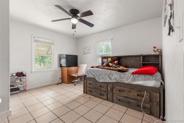 6871 Locust St, Commerce City, CO 80022 - bedroom featuring light tile patterned flooring and ceiling fan