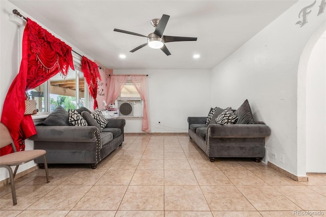 6871 Locust St, Commerce City, CO 80022 - living room with a ceiling fan, light tile patterned flooring, arched walkways, and recessed lighting