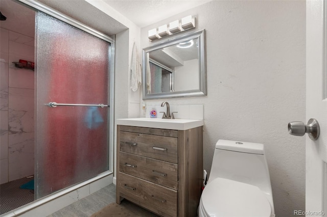 6871 Locust St, Commerce City, CO 80022 - bathroom featuring vanity and a shower stall