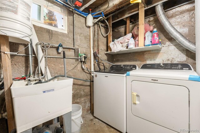 6871 Locust St, Commerce City, CO 80022 - washroom with washing machine and clothes dryer