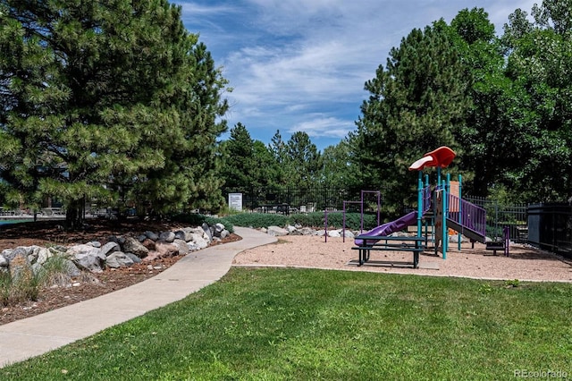 view of jungle gym with a yard