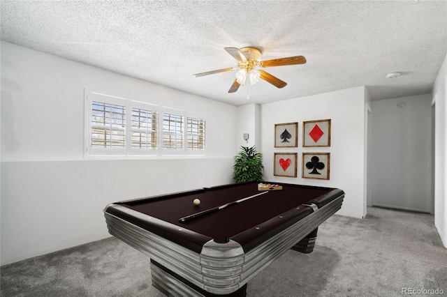 rec room with billiards, ceiling fan, carpet flooring, and a textured ceiling