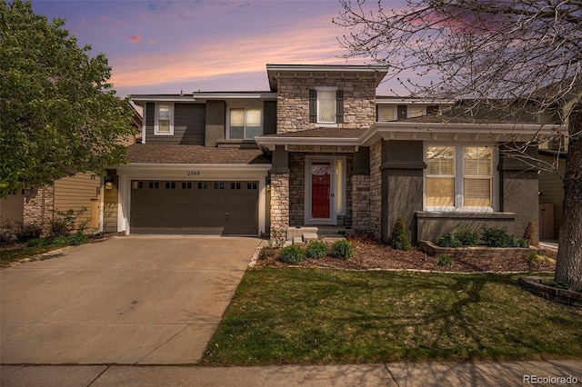2749 Pemberly Ave, Highlands Ranch, CO 80126 - view of front of property featuring concrete driveway, stone siding, a garage, and a front lawn