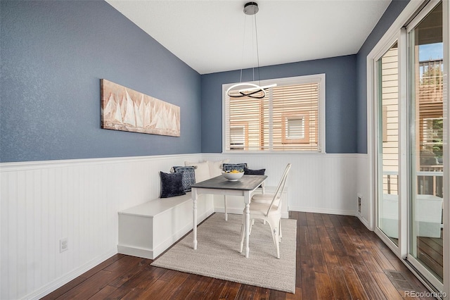 2749 Pemberly Ave, Highlands Ranch, CO 80126 - office area with dark wood finished floors, wainscoting, and a chandelier