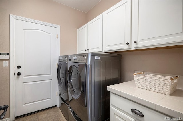2749 Pemberly Ave, Highlands Ranch, CO 80126 - washroom featuring cabinet space and separate washer and dryer