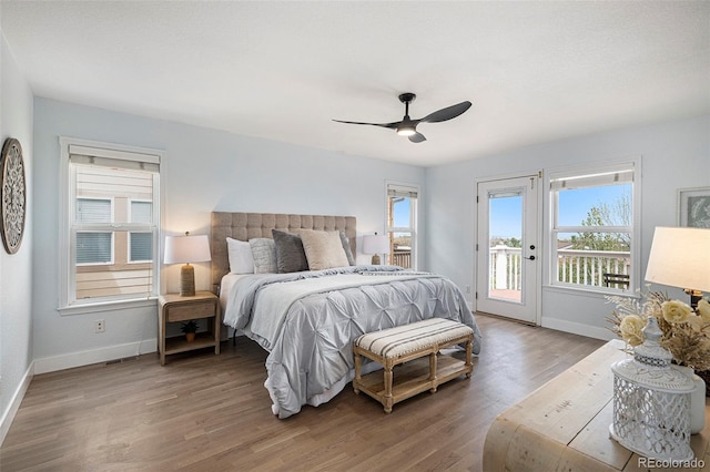 2749 Pemberly Ave, Highlands Ranch, CO 80126 - bedroom with access to exterior, baseboards, and multiple windows