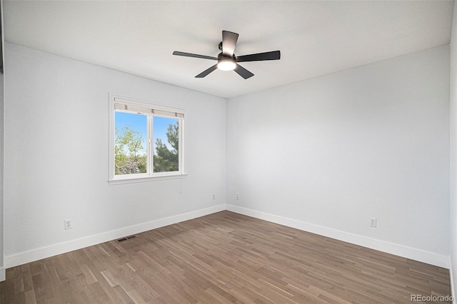 2749 Pemberly Ave, Highlands Ranch, CO 80126 - empty room featuring wood finished floors, baseboards, and a ceiling fan