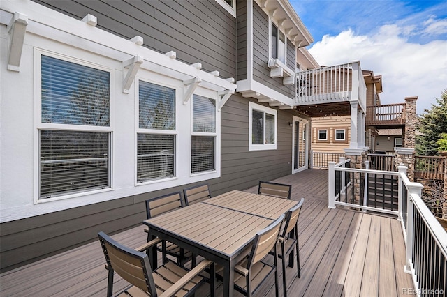 2749 Pemberly Ave, Highlands Ranch, CO 80126 - wooden terrace with outdoor dining area