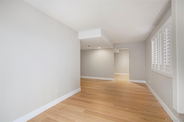 2749 Pemberly Ave, Highlands Ranch, CO 80126 - spare room with baseboards and light wood-style flooring