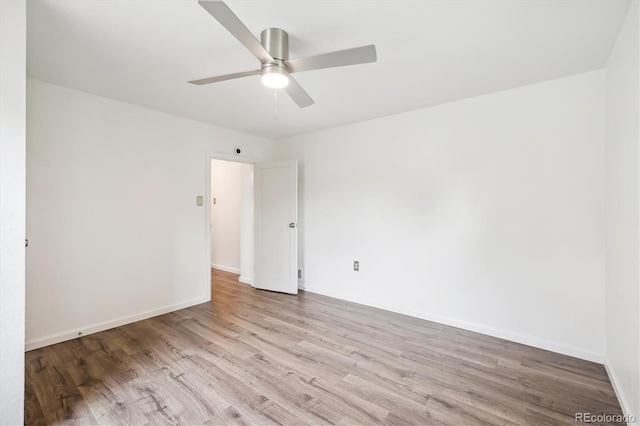 2989 S Corona St, Englewood, CO 80113 - unfurnished room featuring wood finished floors, baseboards, and ceiling fan