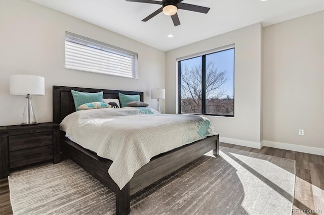 bedroom with ceiling fan, baseboards, wood finished floors, and recessed lighting