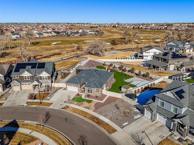 drone / aerial view with a residential view