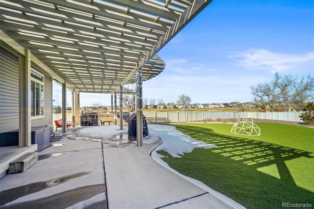 view of patio / terrace with a water view, fence, and a pergola