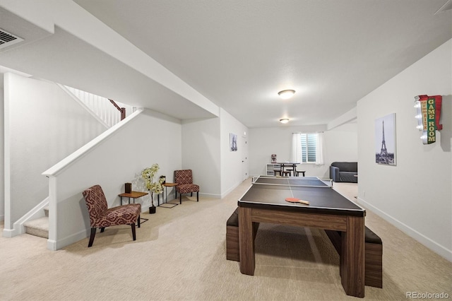rec room featuring carpet flooring, baseboards, and visible vents
