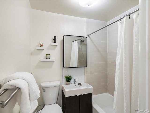 10109 W 68th Ave, Arvada, CO 80004 - full bathroom featuring toilet, vanity, and shower / bath combo with shower curtain