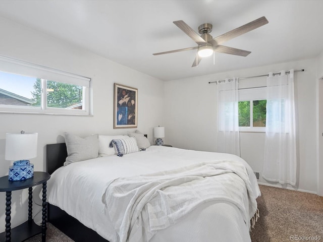 10109 W 68th Ave, Arvada, CO 80004 - carpeted bedroom with a ceiling fan