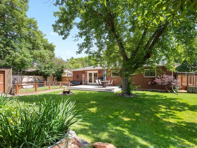 10109 W 68th Ave, Arvada, CO 80004 - view of yard with french doors and a patio