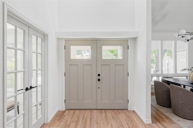 10953 E Crestline Ave, Englewood, CO 80111 - foyer featuring french doors and light wood-style floors