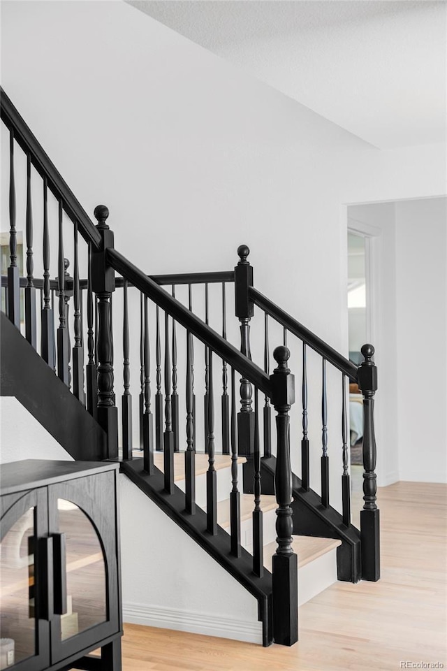 10953 E Crestline Ave, Englewood, CO 80111 - stairway with wood finished floors and baseboards