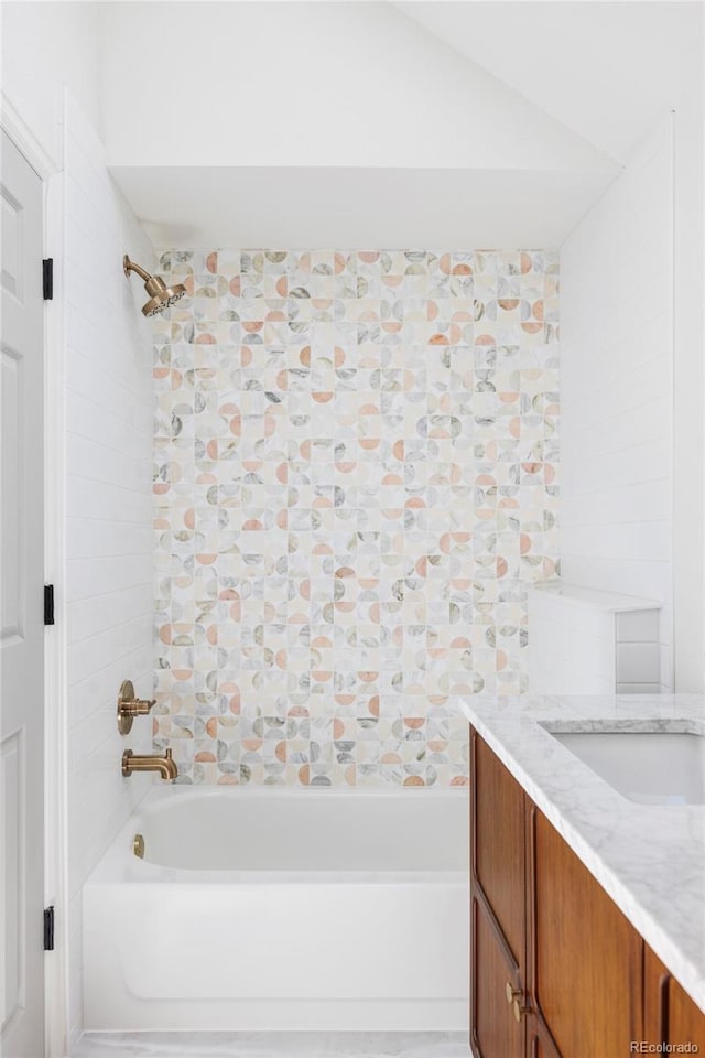 10953 E Crestline Ave, Englewood, CO 80111 - full bath with washtub / shower combination, vanity, and vaulted ceiling