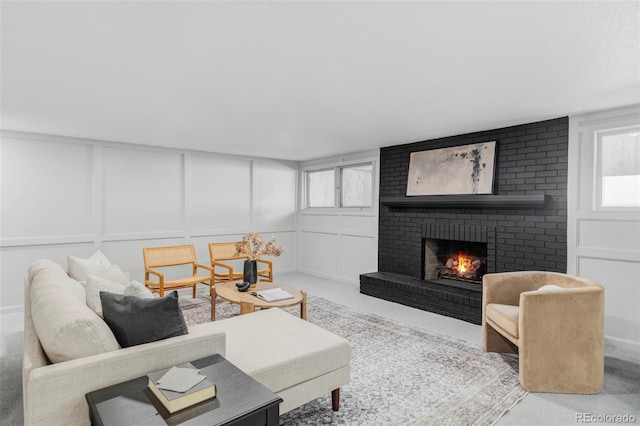 10953 E Crestline Ave, Englewood, CO 80111 - living room with a decorative wall, carpet, a brick fireplace, and plenty of natural light