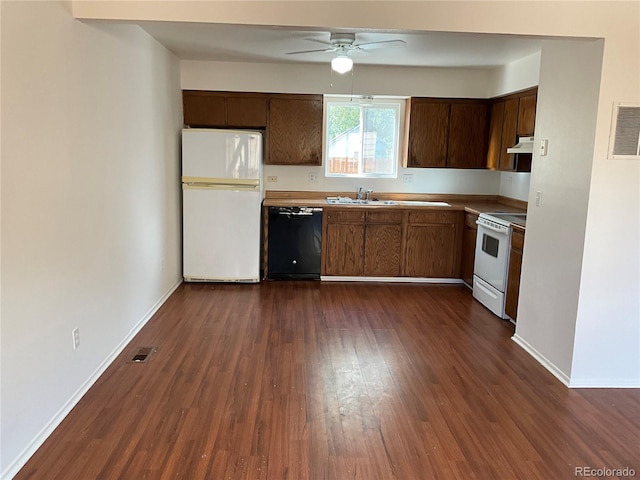 kitchen with ceiling fan, sink, dark hardwood / wood-style floors, and white appliances