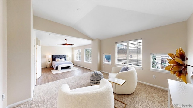 bedroom featuring lofted ceiling, carpet floors, and baseboards