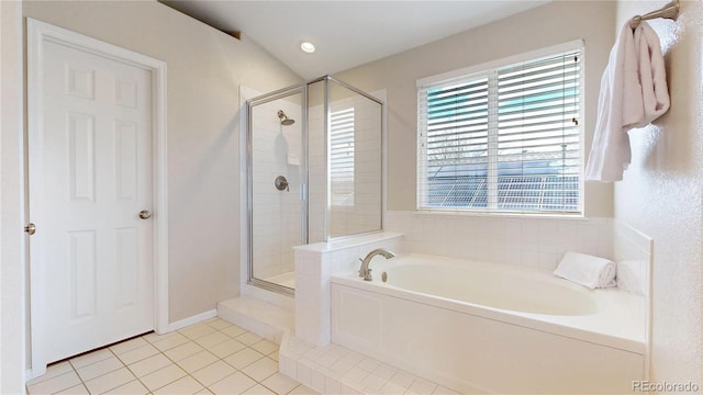 bathroom featuring a garden tub, tile patterned flooring, a shower stall, and a healthy amount of sunlight