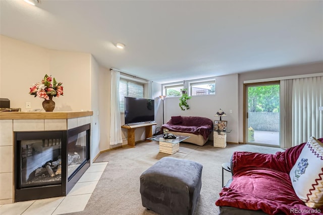 8900 Fox Dr Unit 1, Thornton, CO 80260 - living area featuring carpet and a tiled fireplace