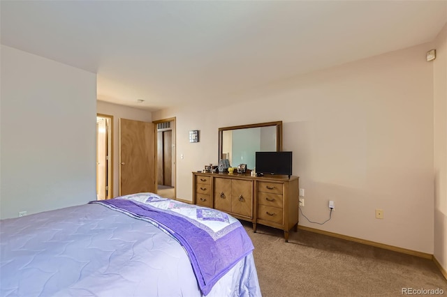 8900 Fox Dr Unit 1, Thornton, CO 80260 - bedroom with light colored carpet and baseboards