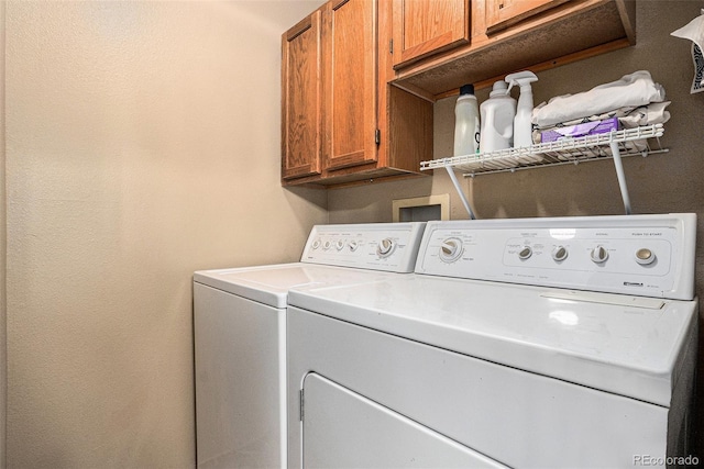 8600 E Alameda Ave Unit 21-208, Denver, CO 80247 - washroom featuring cabinet space and washing machine and clothes dryer
