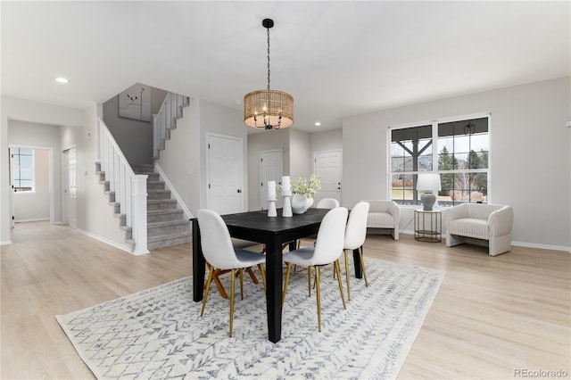 dining space with stairway, recessed lighting, and light wood-style floors