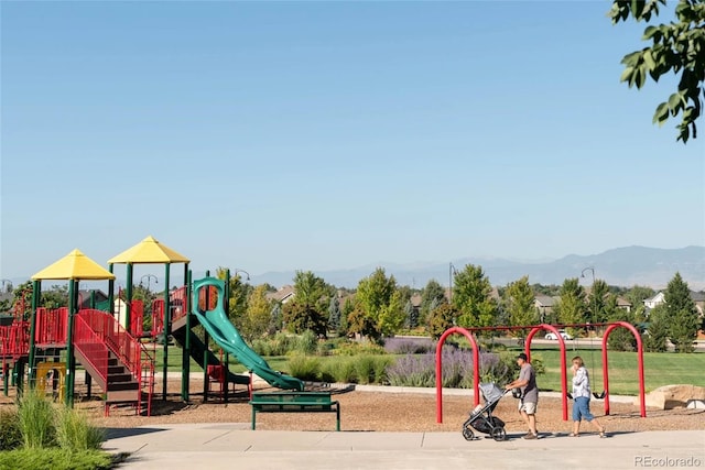 community play area with a mountain view