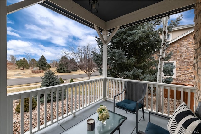 balcony featuring covered porch