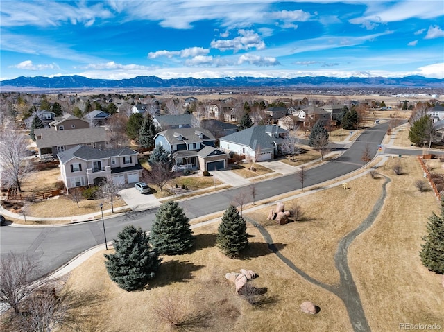 bird's eye view featuring a residential view and a mountain view