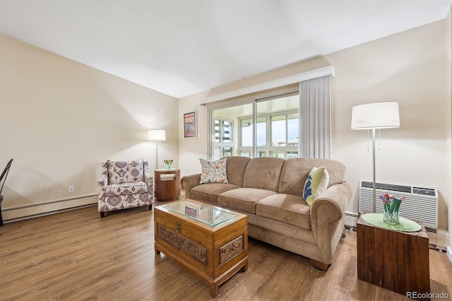 9625 E Center Ave Unit 5D, Denver, CO 80247 - living area featuring wood finished floors, baseboard heating, and a wall mounted air conditioner