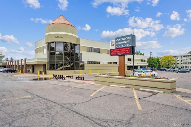 9625 E Center Ave Unit 5D, Denver, CO 80247 - view of commercial property featuring uncovered parking