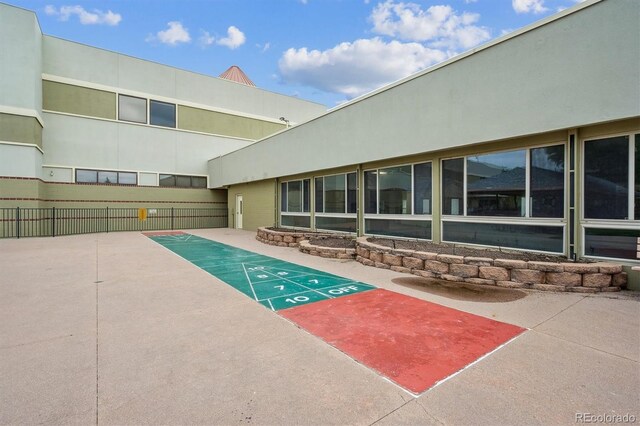 9625 E Center Ave Unit 5D, Denver, CO 80247 - view of home's community featuring shuffleboard