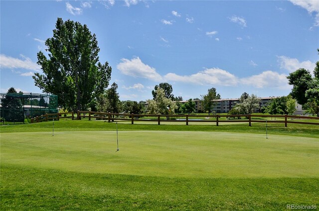 9625 E Center Ave Unit 5D, Denver, CO 80247 - view of community featuring a putting area and golf course view